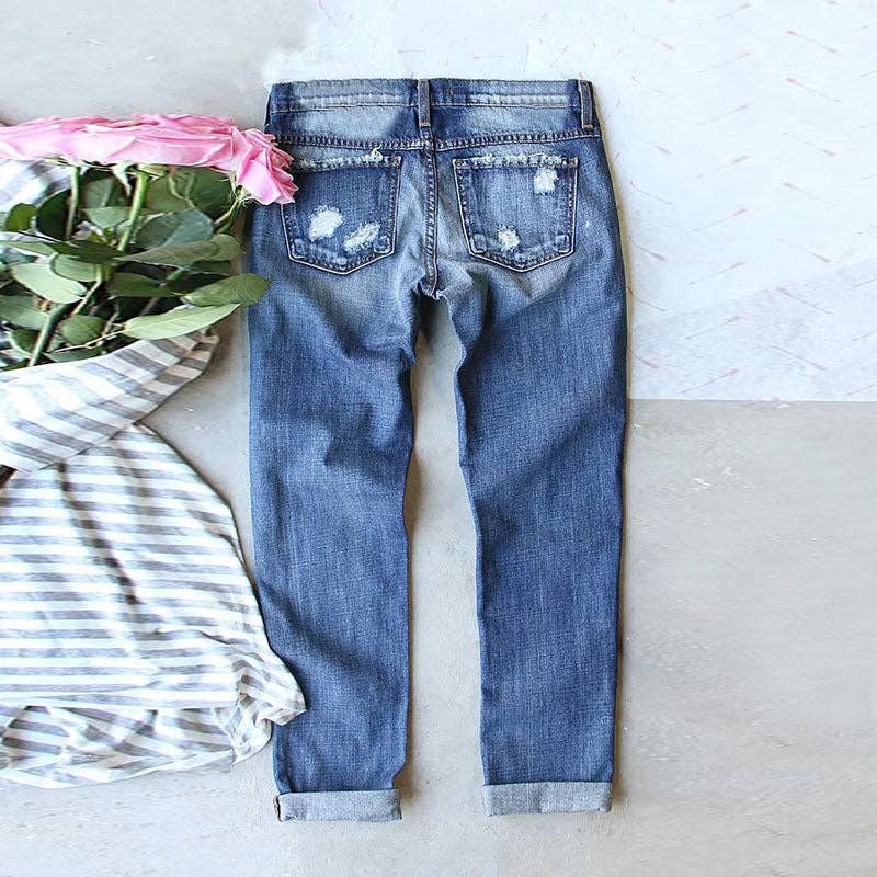 Women’s Light Wash Ripped Jeans with Christmas Grinch Patche