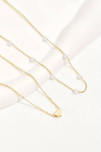Gold Layered Necklace with Heart Pendant and Pearl Accents